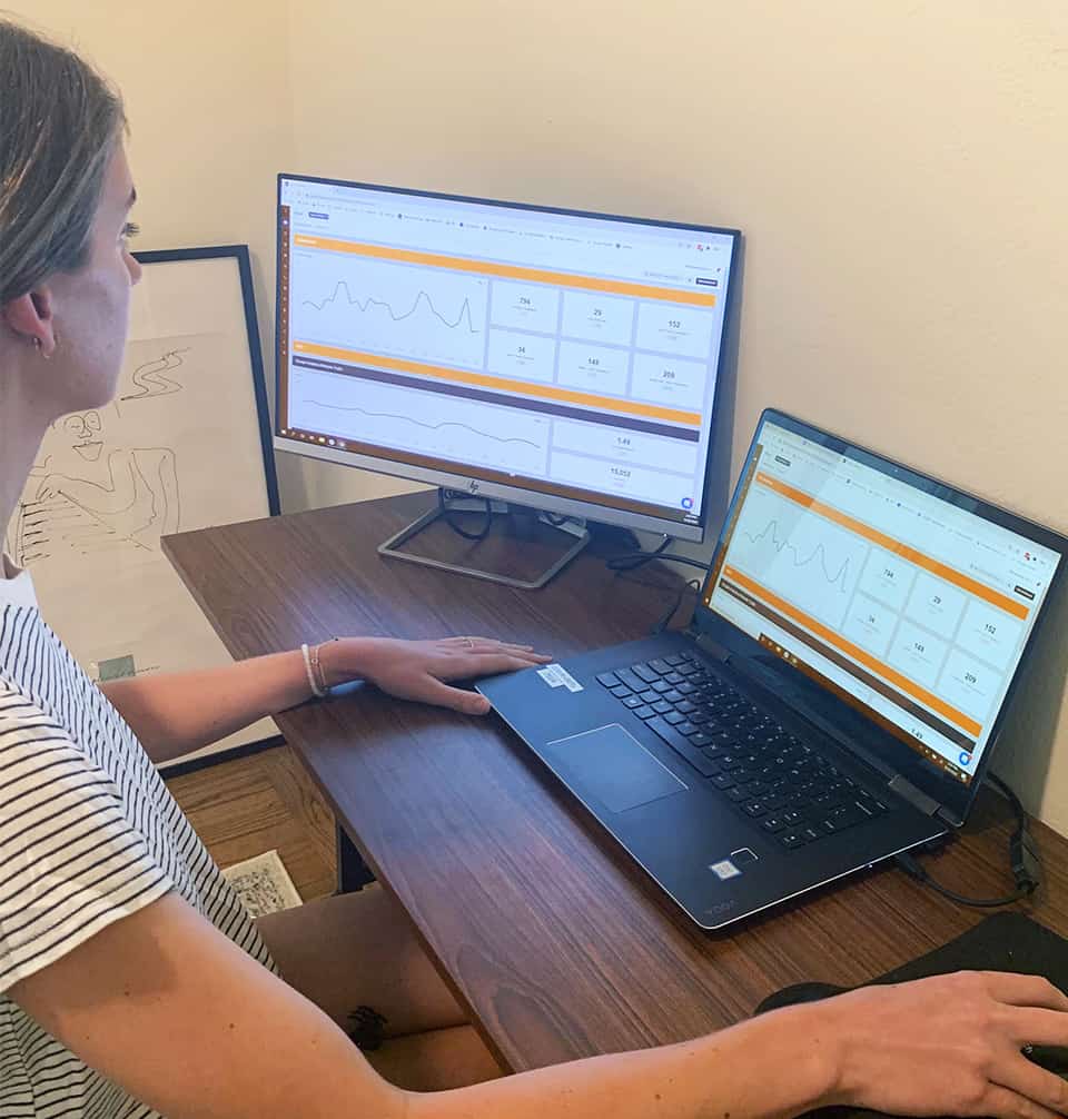 woman reviewing google analytics for ads