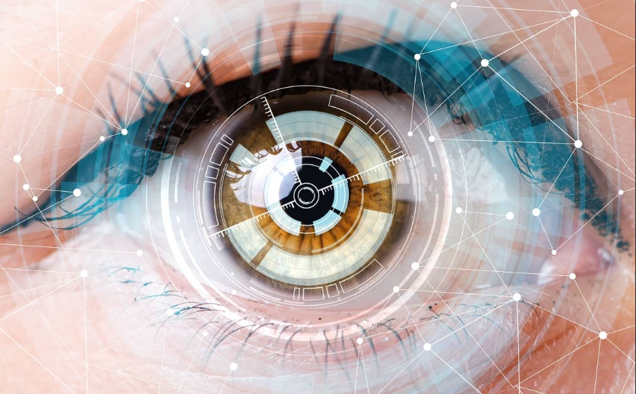 Photo of an eye with computer generated futuristic data visualization above it