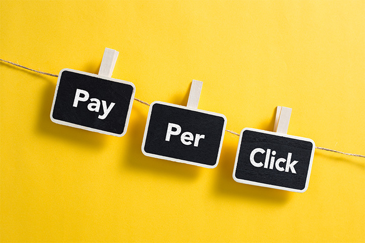 Pay Per Click signs on clothesline