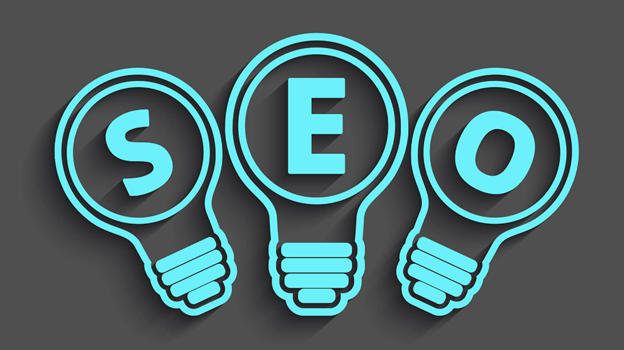 3 Illustrated lightbulbs with a single letter in each spelling out SEO